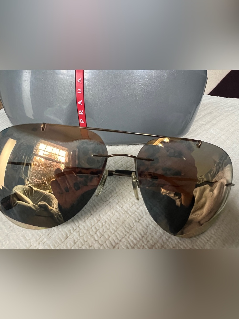 PRADA Rimless Aviator Sunglasses